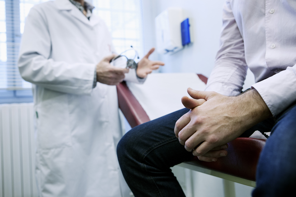 doctor talking with patient.